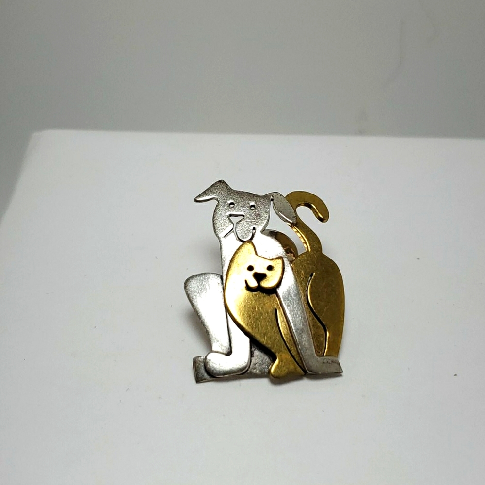 Silver and gold cat and dog pin